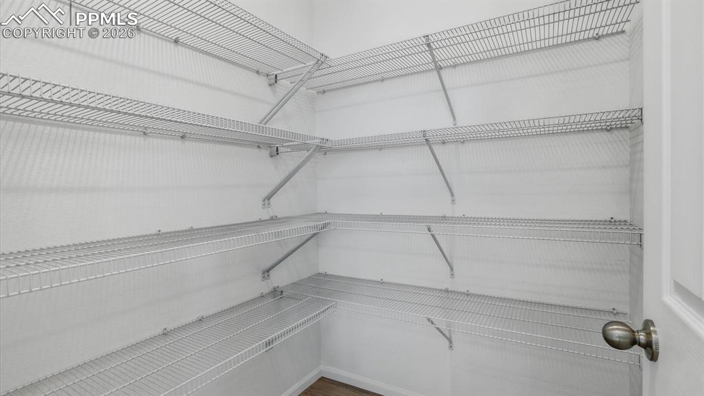 Image 18 of 45: Large Kitchen pantry.