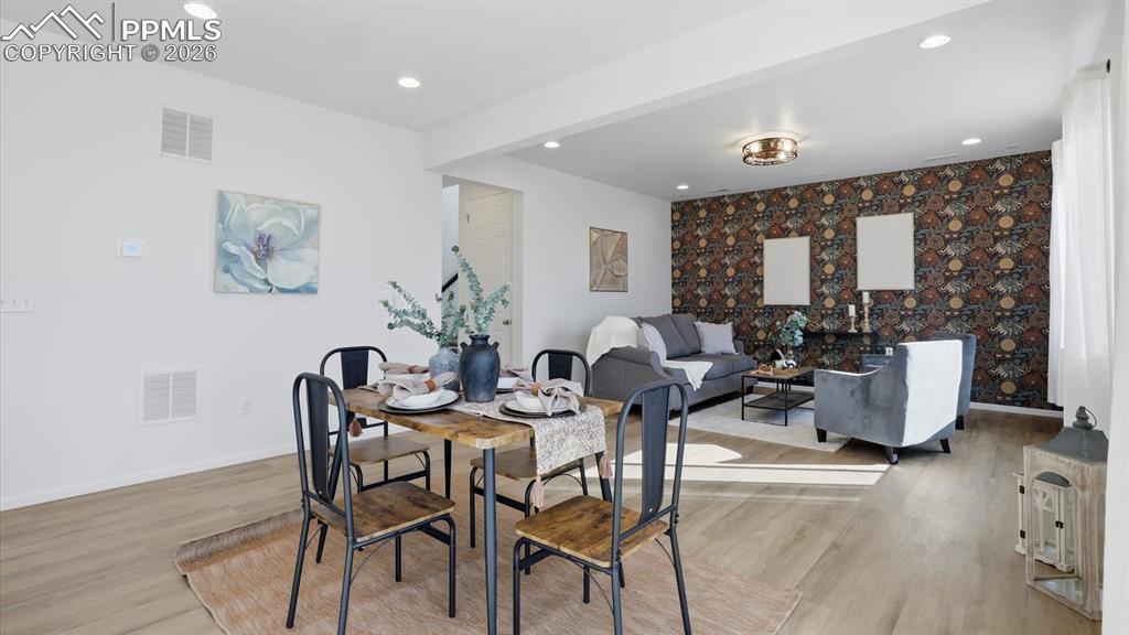 Image 20 of 45: Dining Area and Great Room.