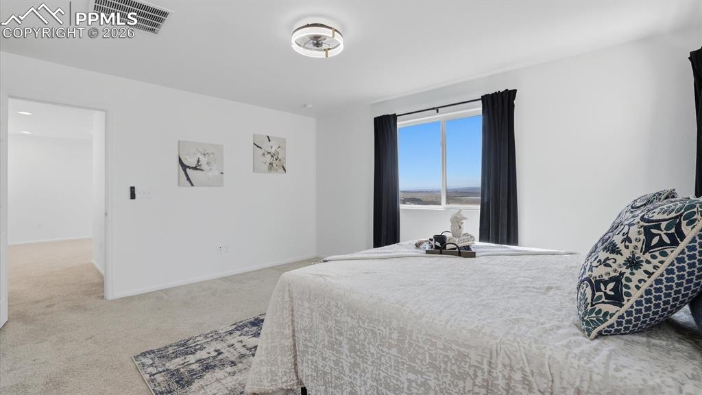 Image 29 of 45: Upper Level Primary Bedroom.