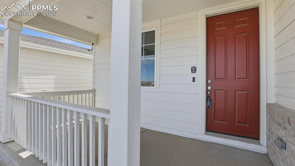 Image 5 of 45: Covered front porch.