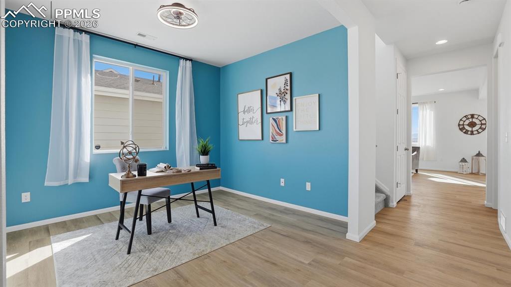 Image 8 of 45: View of the Office and hallway into the Great Room from the Entry.