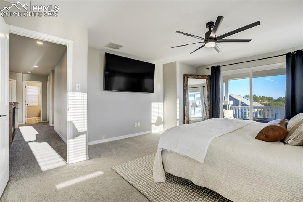 Image 18 of 50: Spacious with the sliding door that leads to the private balcony. 