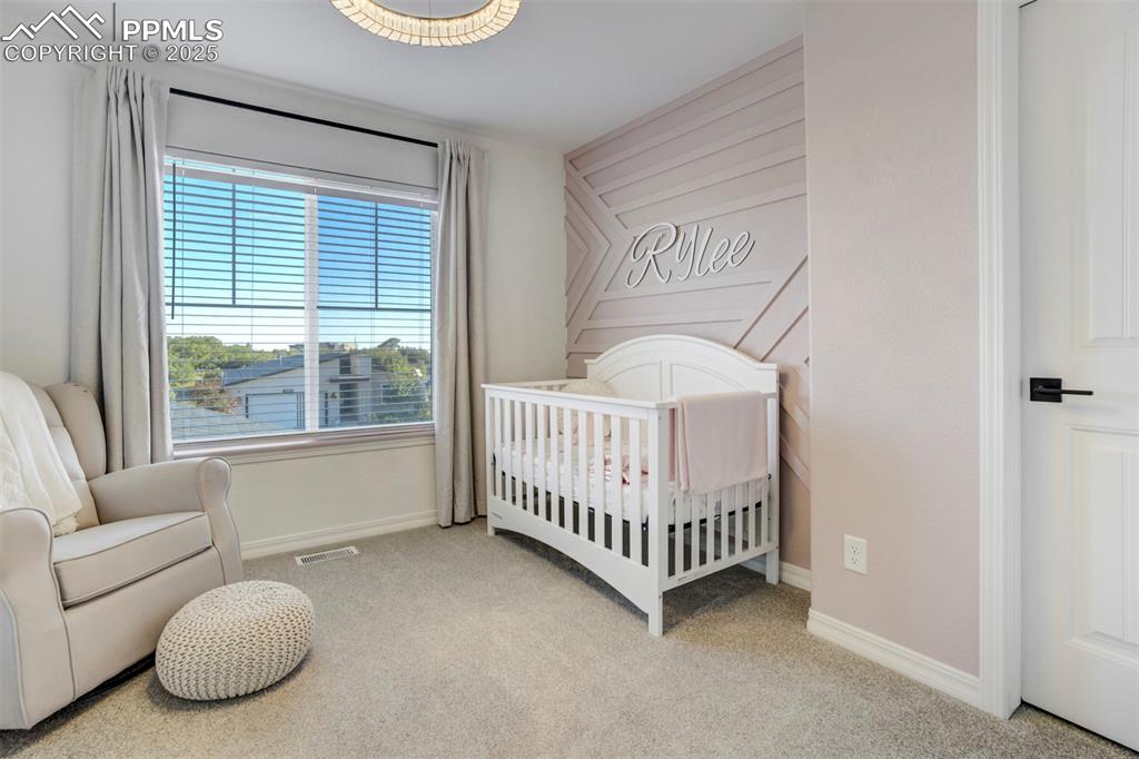 Image 24 of 50: Bedroom 4 upstairs has a walk-in closet. 