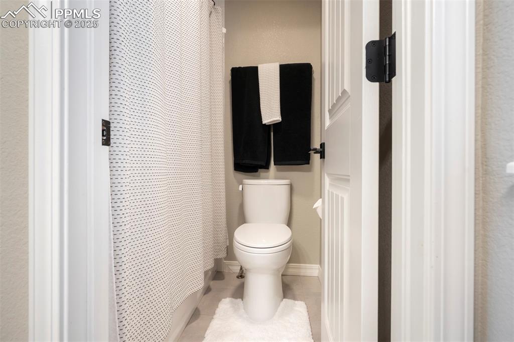 Image 27 of 50: Private water closet in the bathroom. 