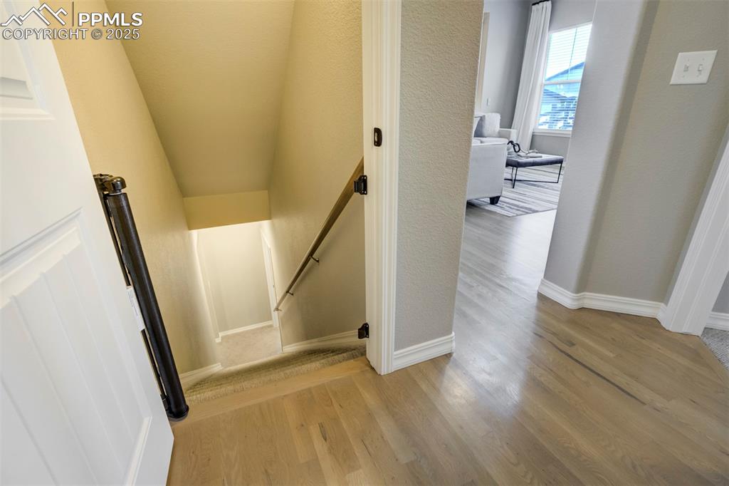 Image 30 of 50: Heading down to the finished basement. 