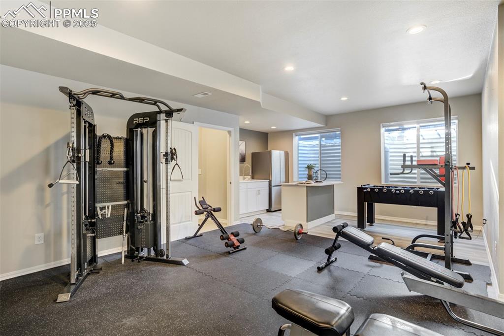Image 32 of 50: Mini kitchen area in the basement. 