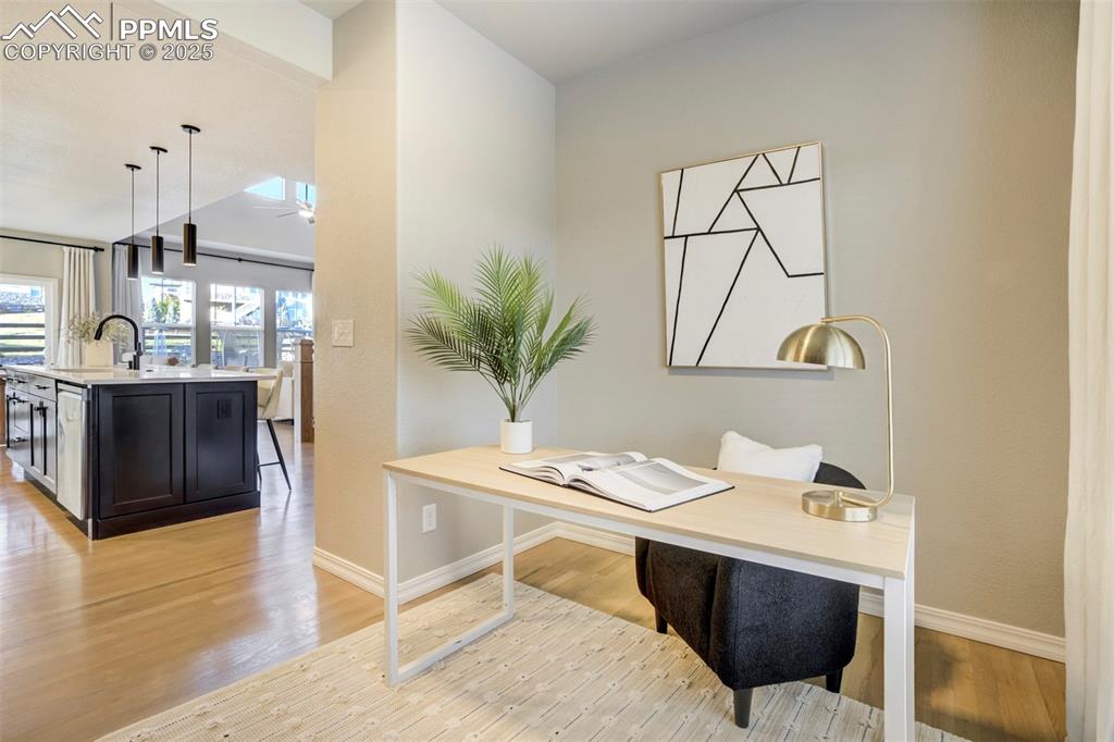 Image 9 of 50: Bonus room is the perfect office or formal dining space. 