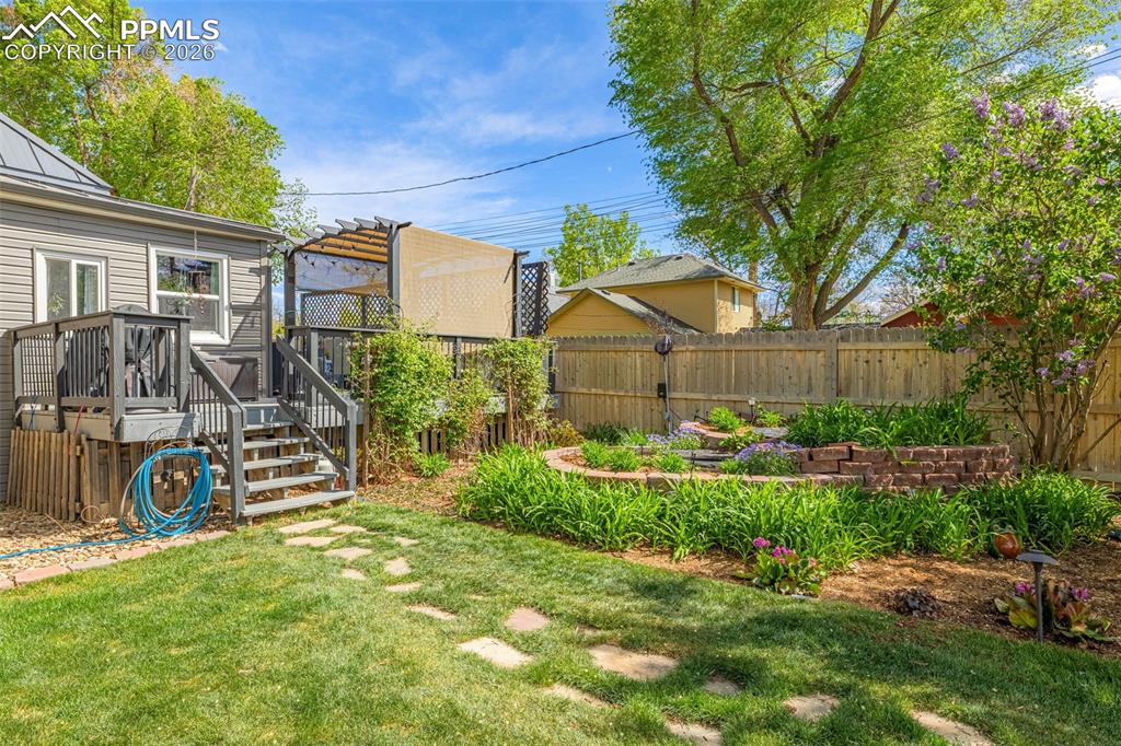 Image 36 of 41: Space to live, garden, and grow