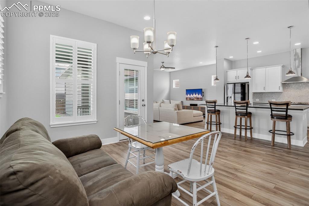Image 14 of 50: Dining and breakfast bar area walks out to the patio - great for entertaini