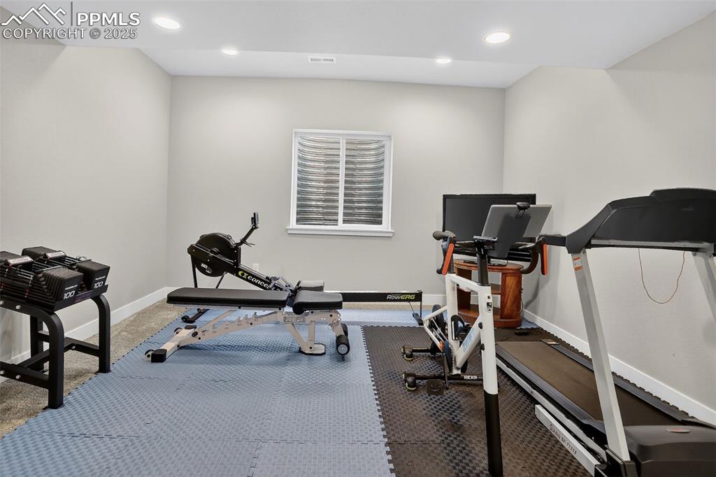 Image 35 of 50: The seller uses this part of the basement for a workout space. You have ple