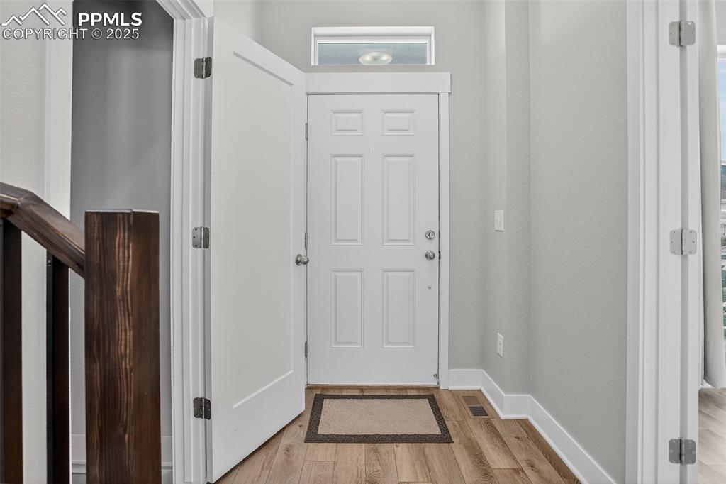 Image 4 of 50: As you enter you will immediately notice this home is flooded with lots of 