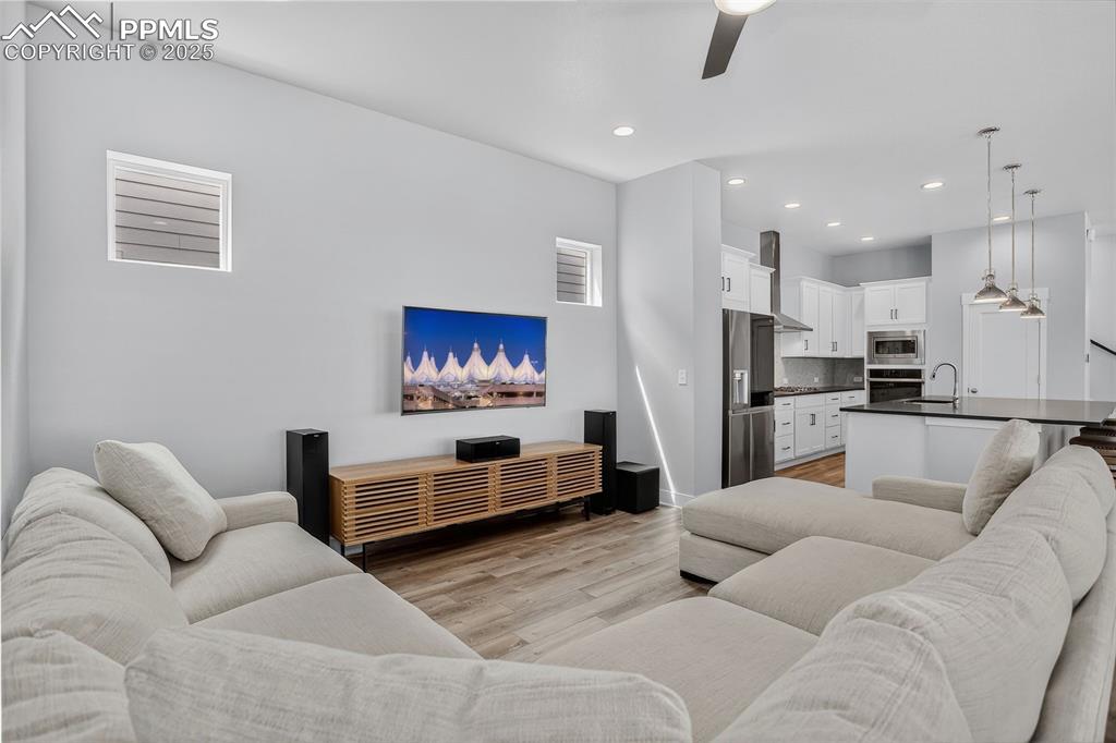 Image 6 of 50: Large living space with plenty of room for your seating and entertainment s