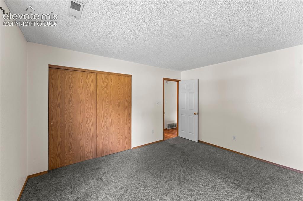 Image 15 of 19: Bedroom