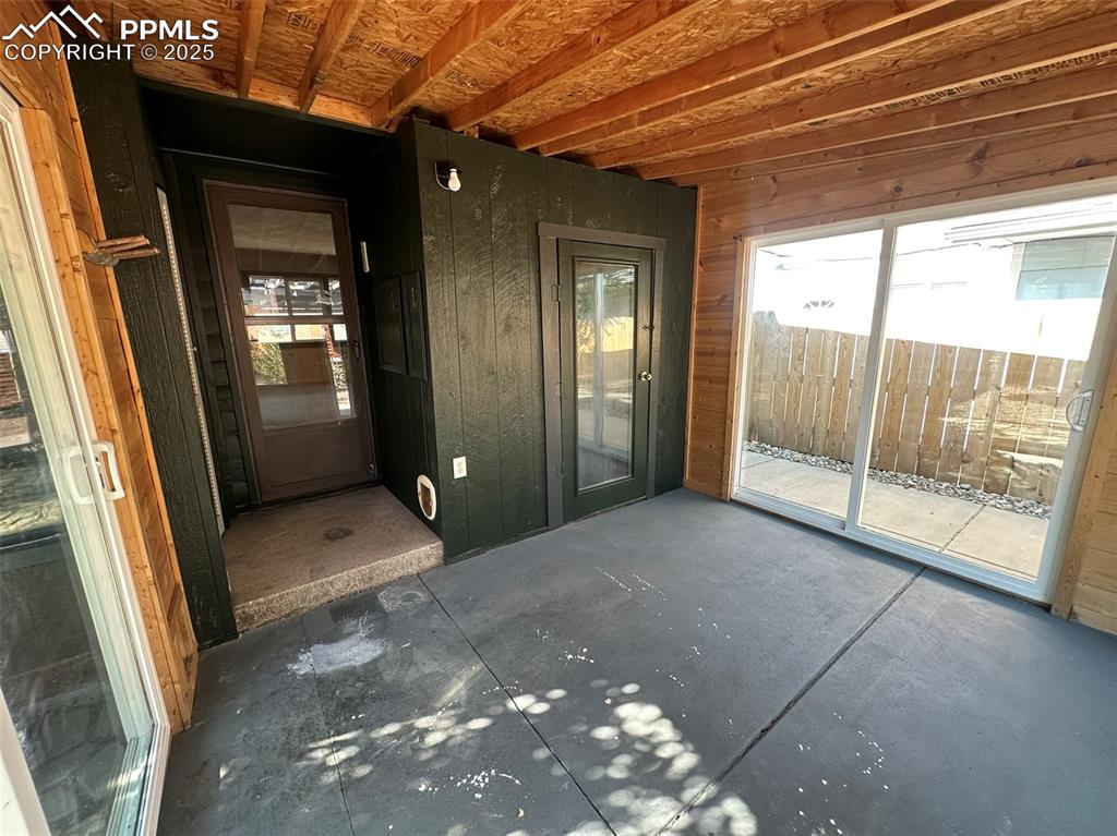 Image 20 of 27: View of sunroom
