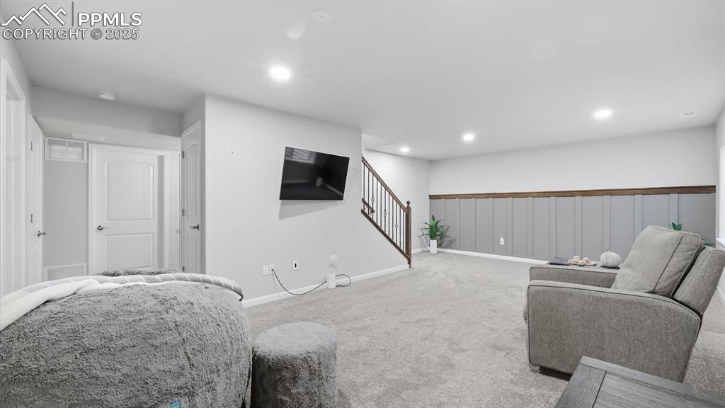 Image 26 of 42: Basement Family Room.