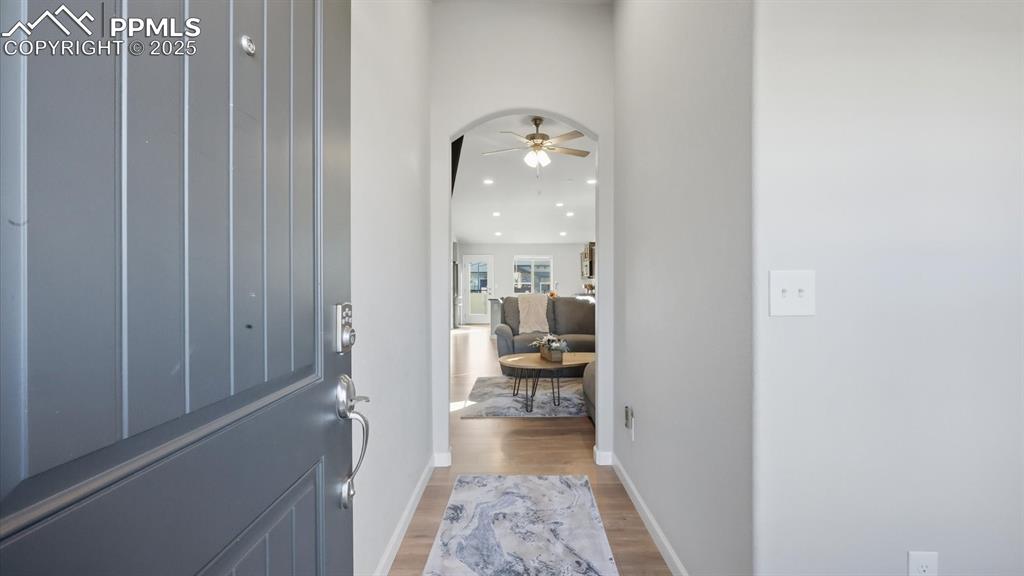 Image 7 of 42: Front Entry with attractive LVP floors into the Living Room.