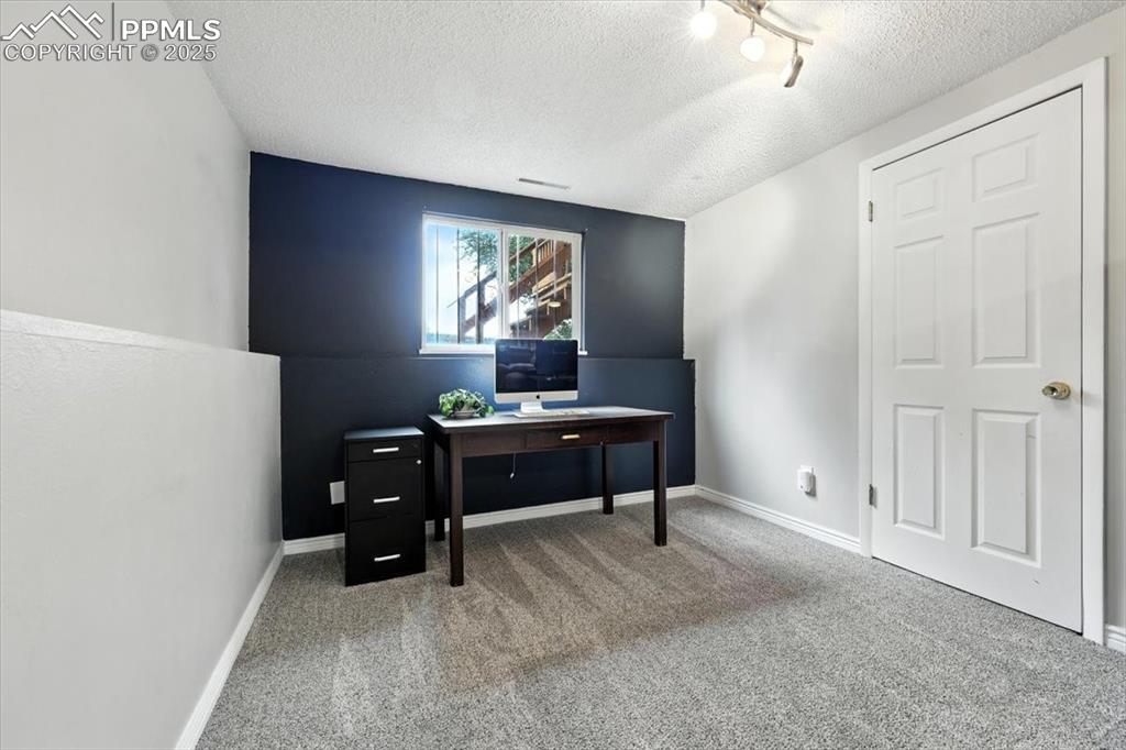 Image 26 of 36: This area is behind the tv in the family room.