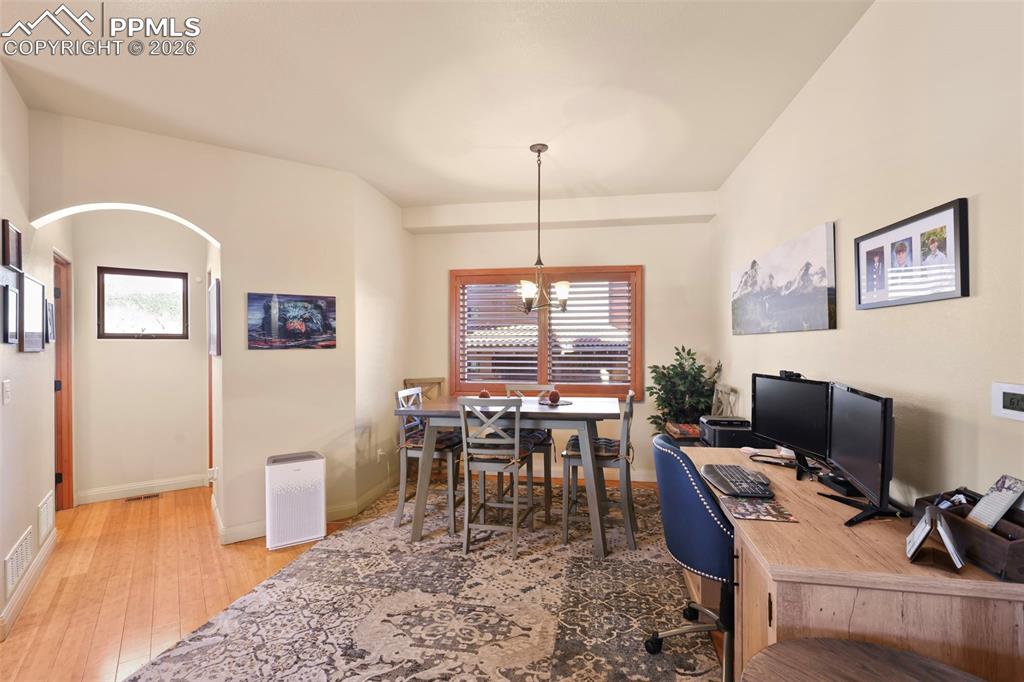 Image 3 of 19: Office area featuring light wood-type flooring and baseboards