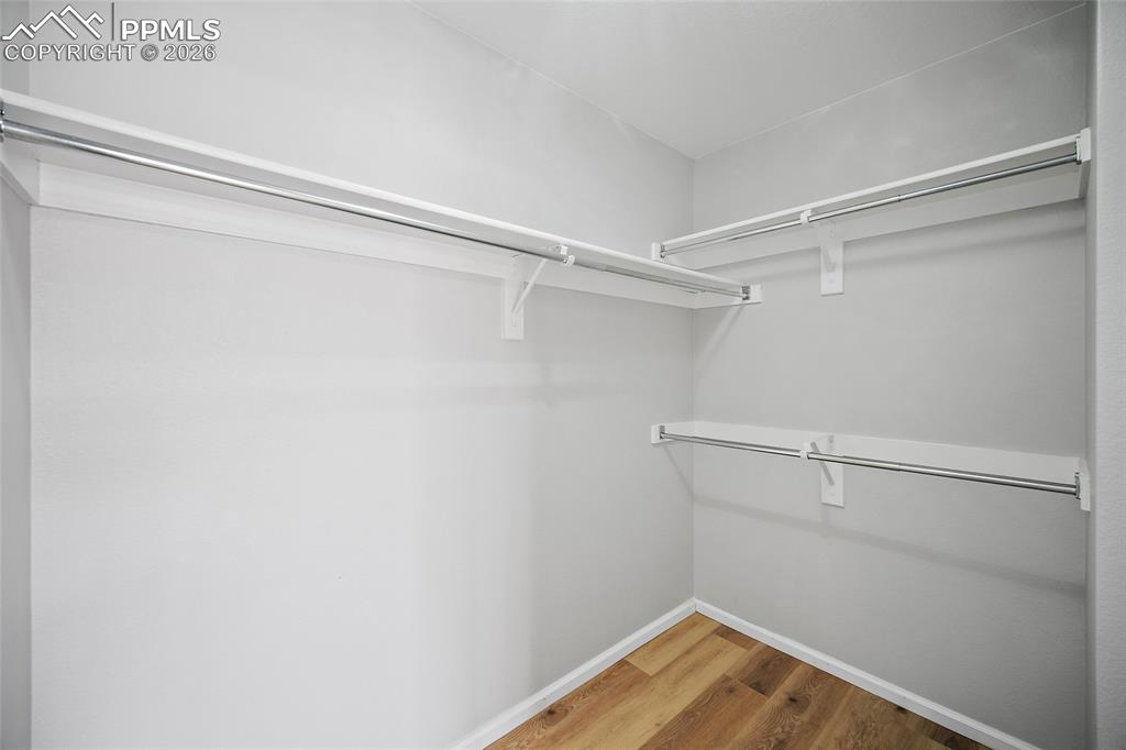 Image 27 of 46: Primary Walk-In-Closet