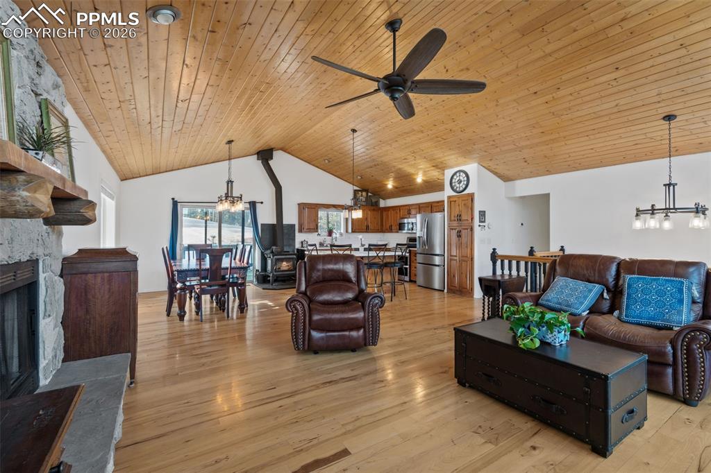 Image 10 of 47: Great room with wood floors