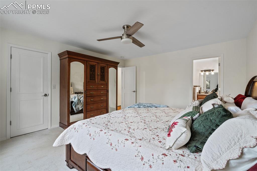 Image 18 of 47: Primary with ceiling fan