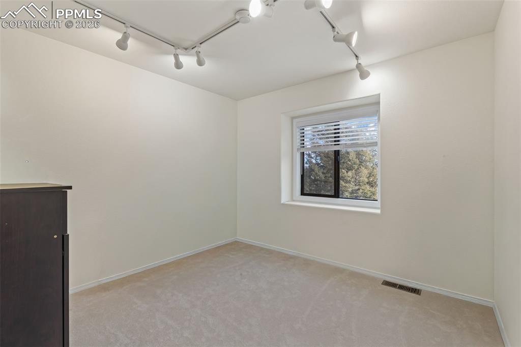 Image 24 of 47: Third bedroom