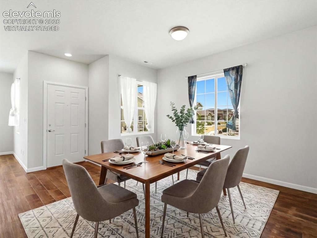 Image 10 of 44: virtually staged dining area