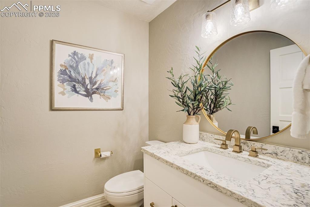 Image 27 of 50: Main level Powder Room