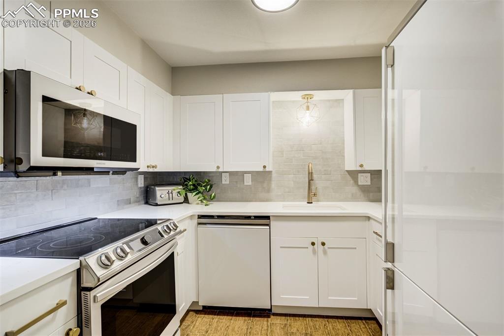 Image 39 of 50: Basement kitchen