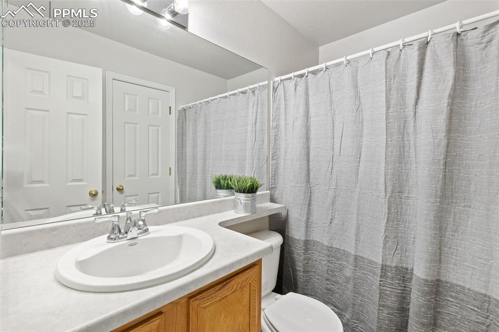 Image 18 of 34: Main level bathroom