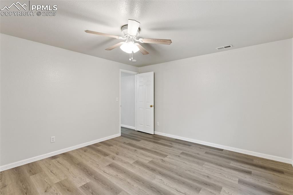 Image 25 of 34: Bedroom #3 in basement