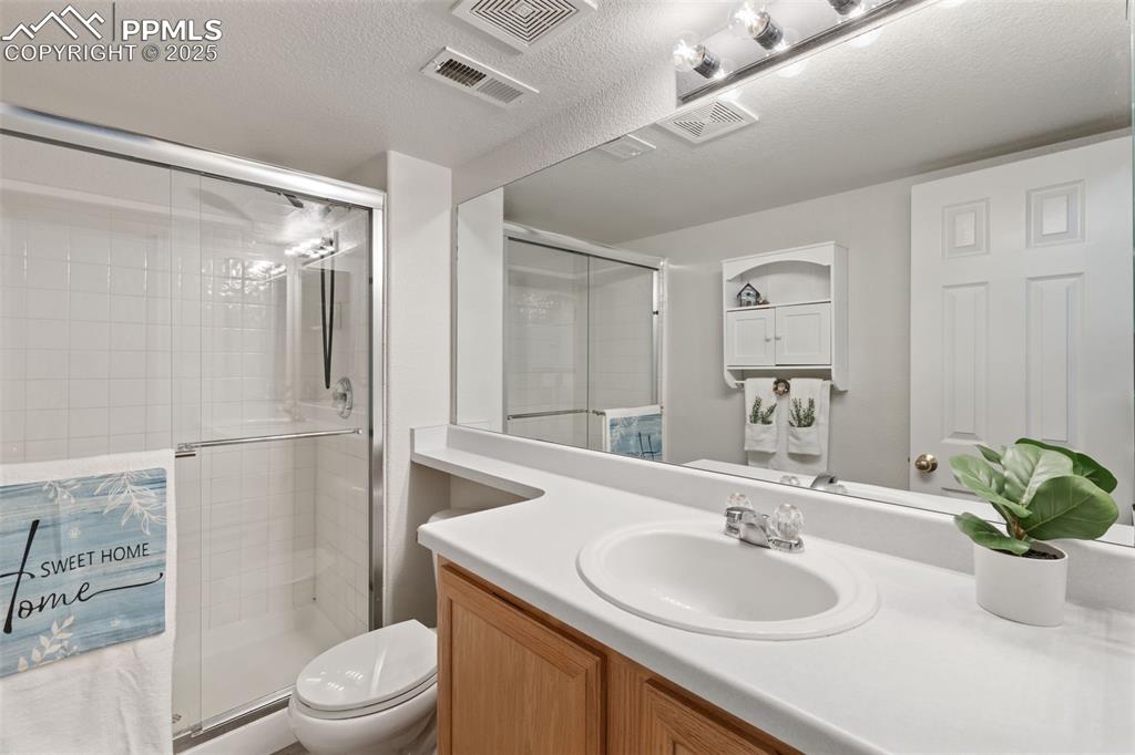 Image 26 of 34: Bathroom in basement