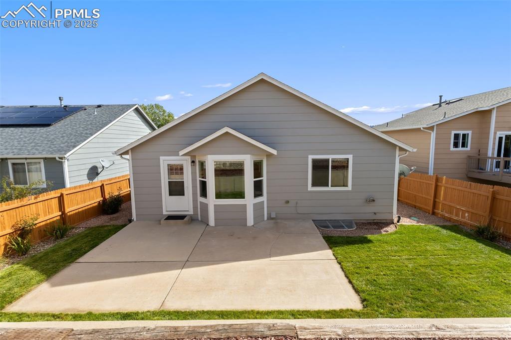 Image 32 of 34: Back of home