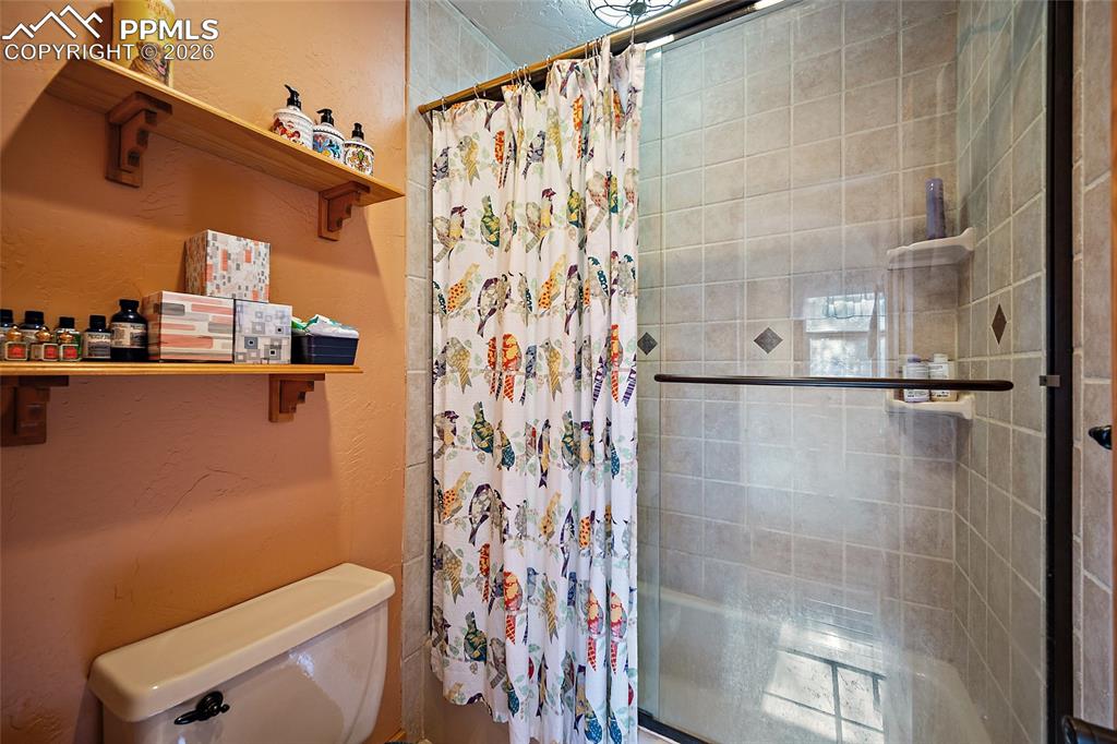 Image 15 of 32: Full master bathroom.