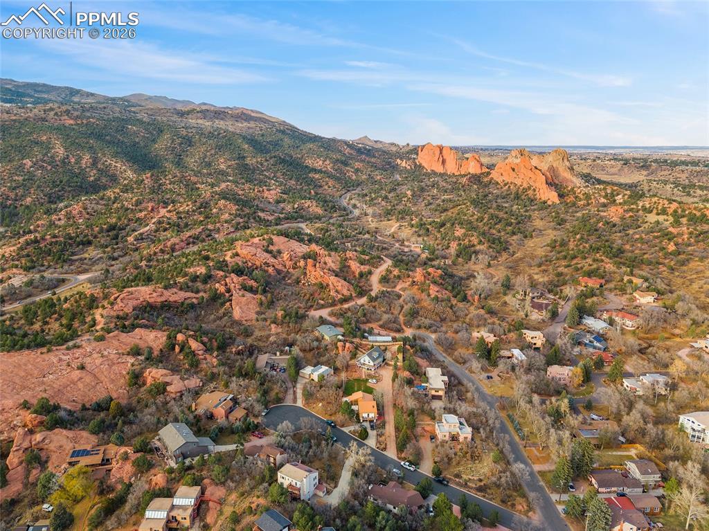 Image 30 of 32: View of Garden of the Gods and surrounding areas with the entrire property 
