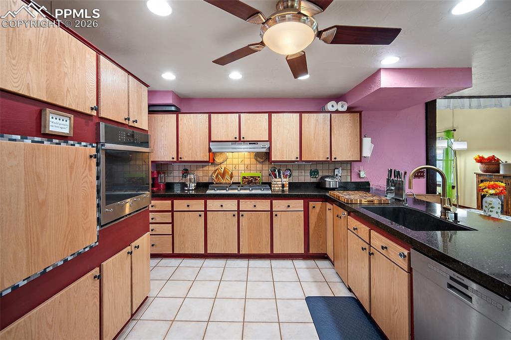 Image 8 of 32: Main view of open kitchen.