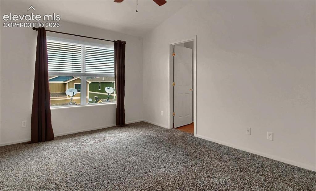 Image 16 of 24: When vacant primary bedroom angle towards bathroom entrance