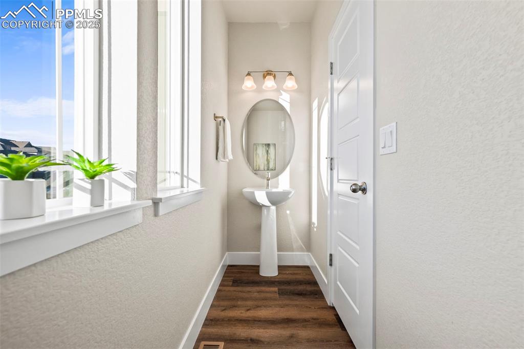 Image 15 of 41: Half bath on the main level!