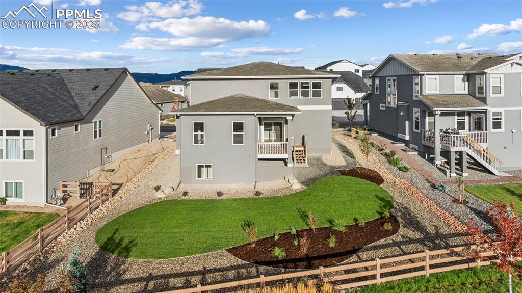 Image 32 of 41: Fully landscaped yard with back and side fencing!