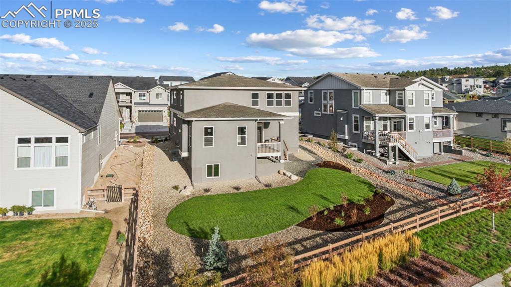 Image 35 of 41: Covered deck and real grass!