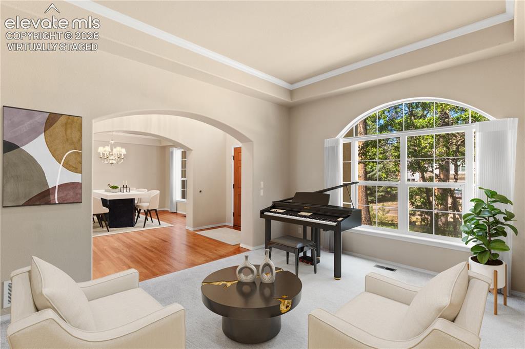 Image 12 of 50: *virtually staged* Formal living room