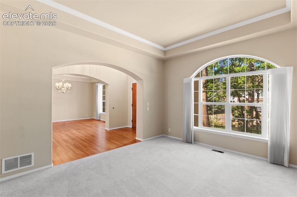 Image 13 of 50: Formal living room