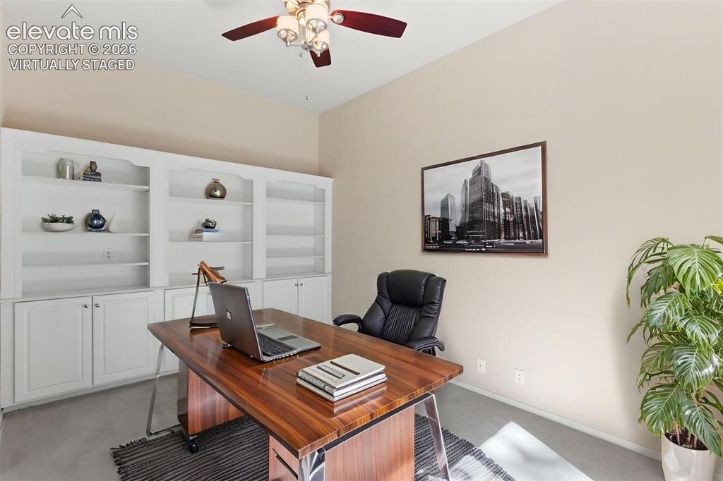 Image 19 of 50: *virtually staged* Dedicated main level office with french doors and ceilin