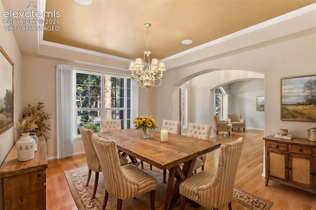 Image 6 of 50: *virtually staged* Formal dining room