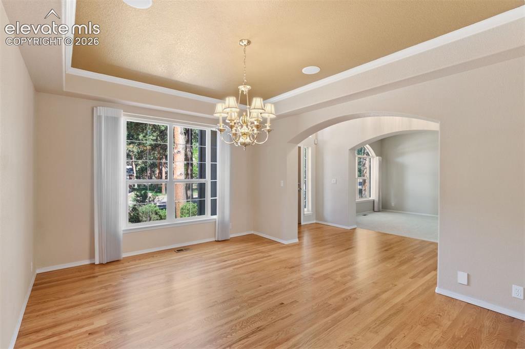 Image 7 of 50: Formal dining room