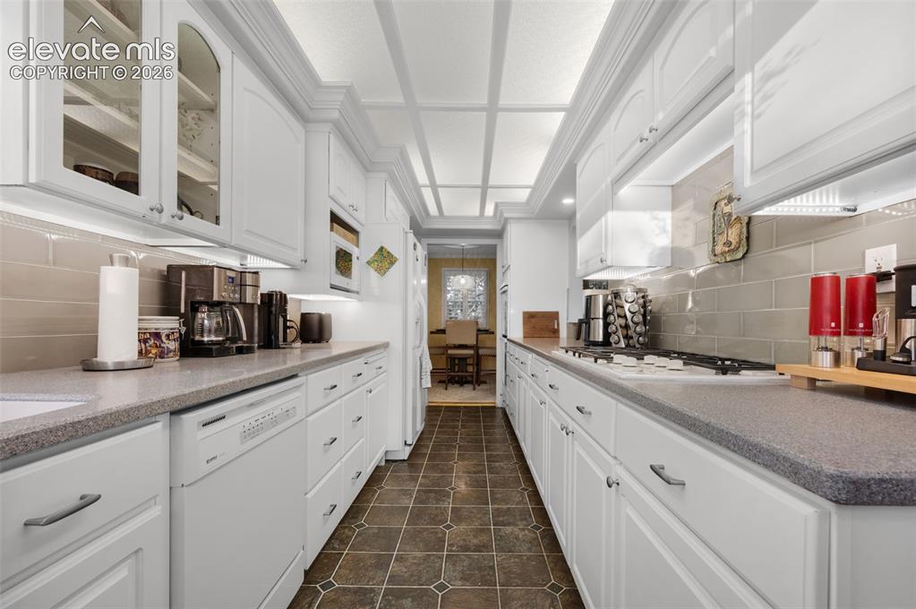 Image 14 of 50: tons of lighting including under cabinets