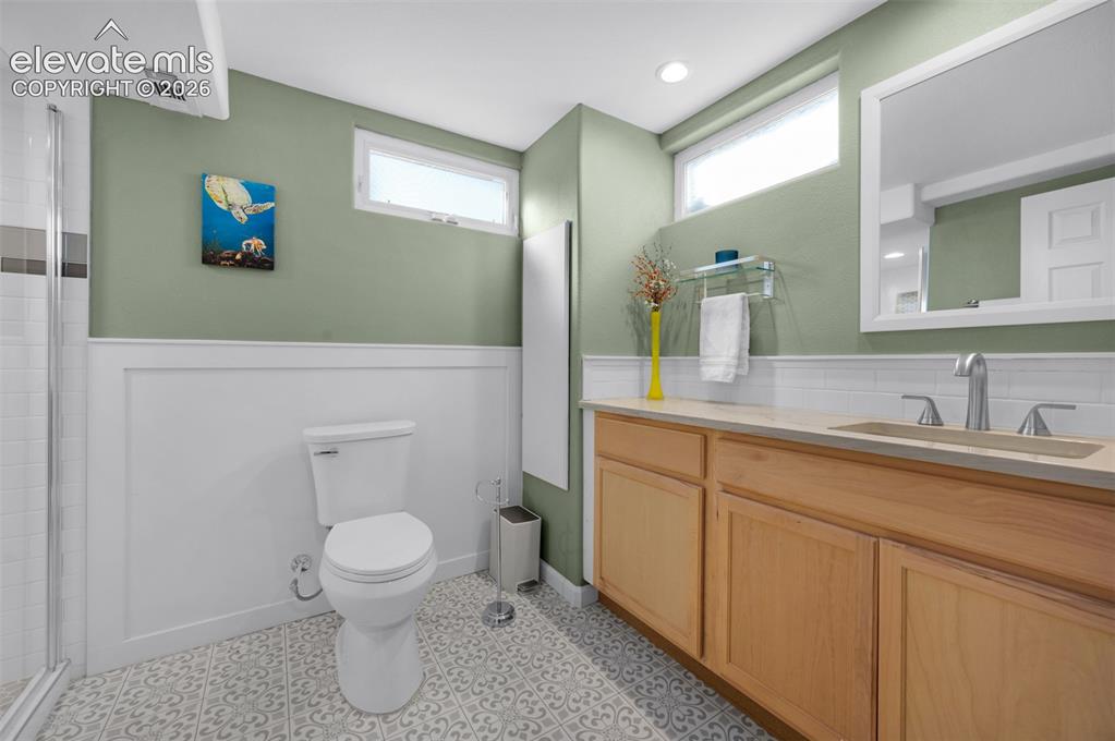 Image 28 of 50: Large basement bathroom