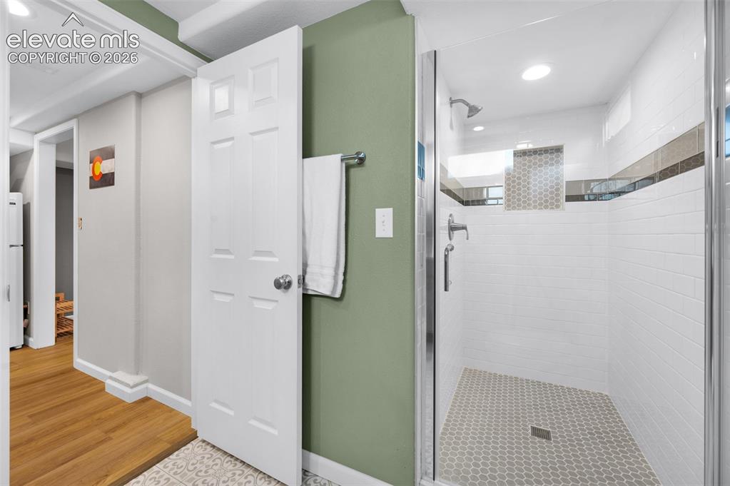 Image 29 of 50: Huge basement shower