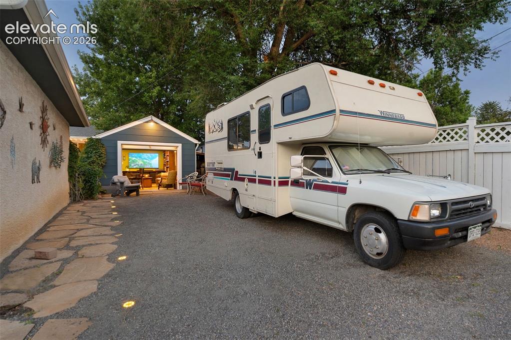 Image 34 of 50: Large RV parking space with plenty of room. Lighted walkway
