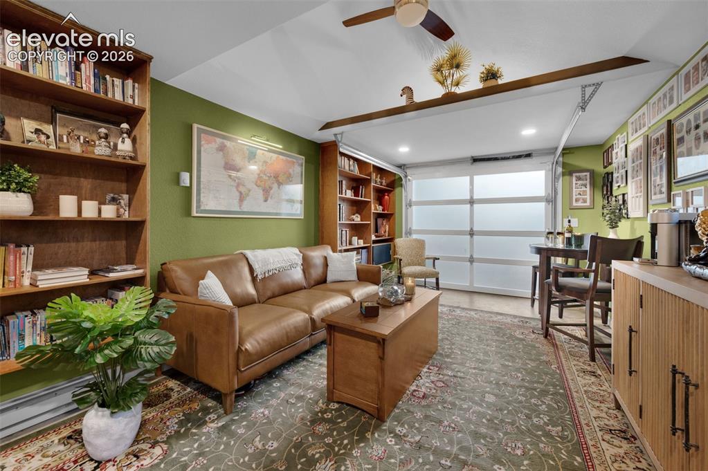 Image 35 of 50: Fabulous room for anyone. Custom bookshelves